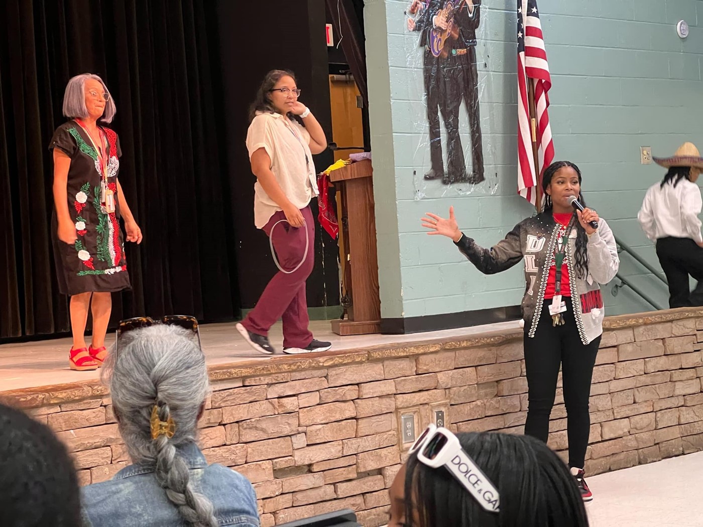 principal bishop speaking on hispanic heritage night