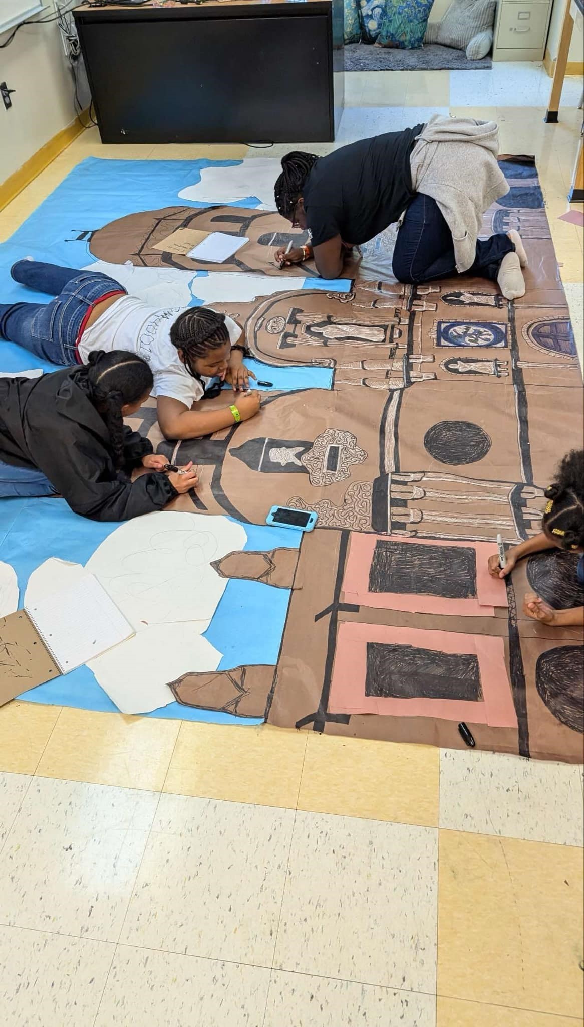 art club working on a backdrop for hispanic heritage month